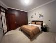Fully furnished bedroom with comfortable bedding